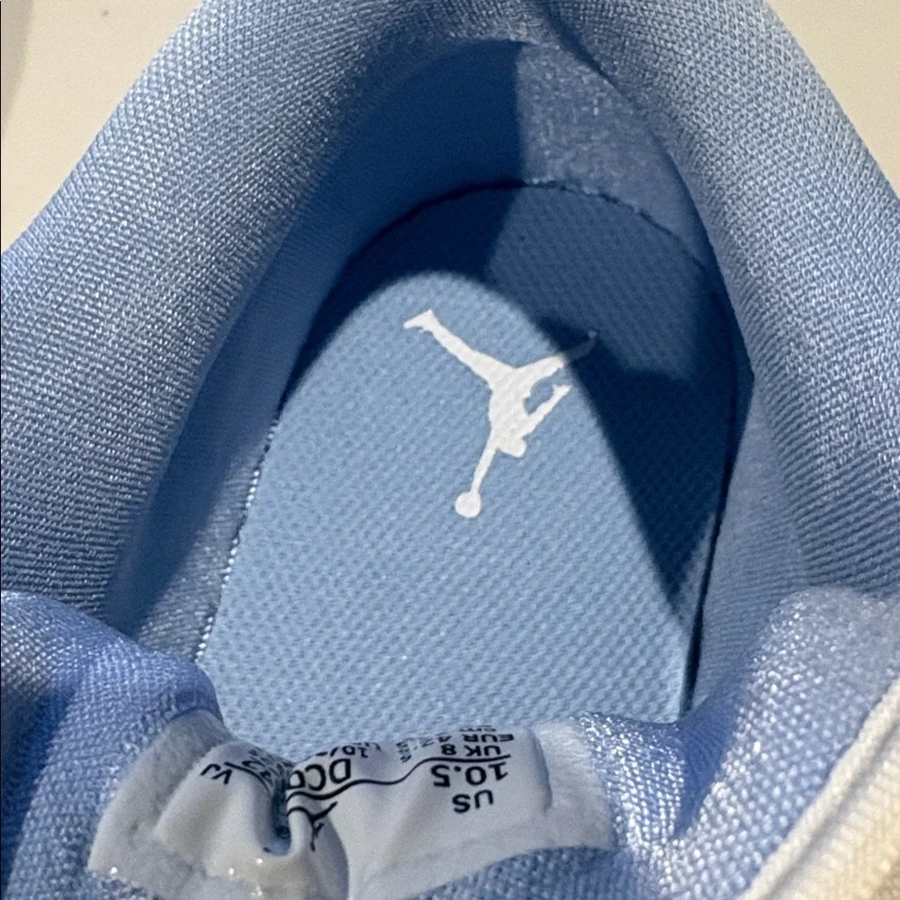 Nike - Women's Air Jordan Retro 1 Low Sneakers. White and baby blue.